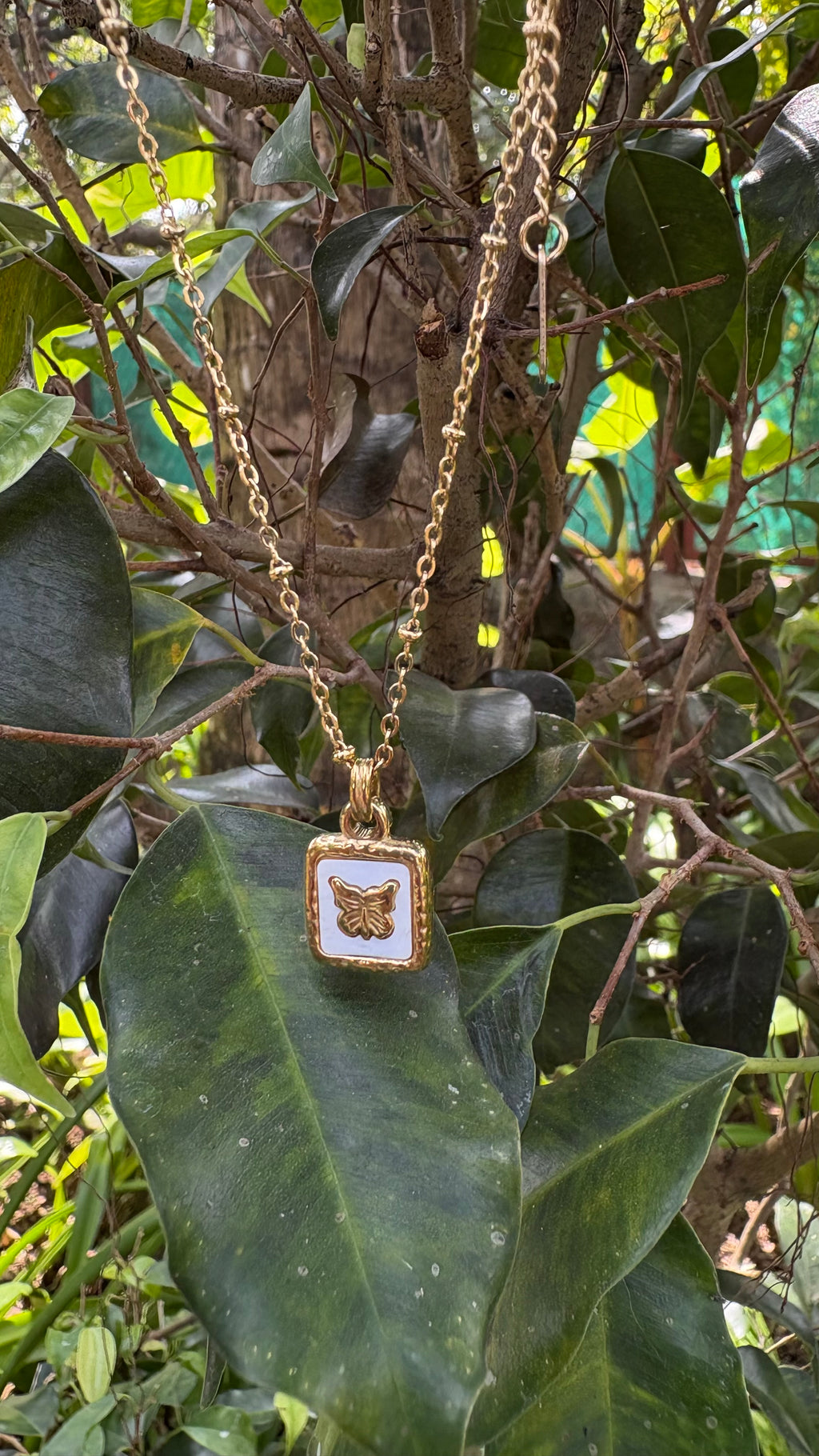 Butterfly studded in she’ll square necklace