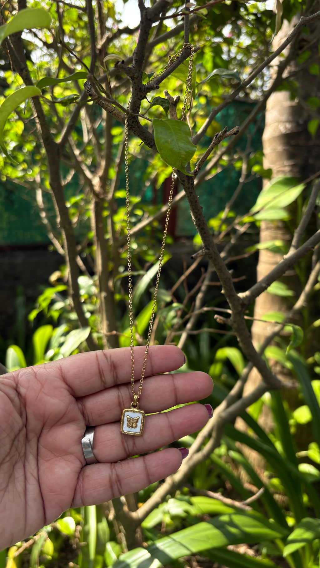 Butterfly studded in she’ll square necklace