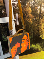 Natni square clutch bag