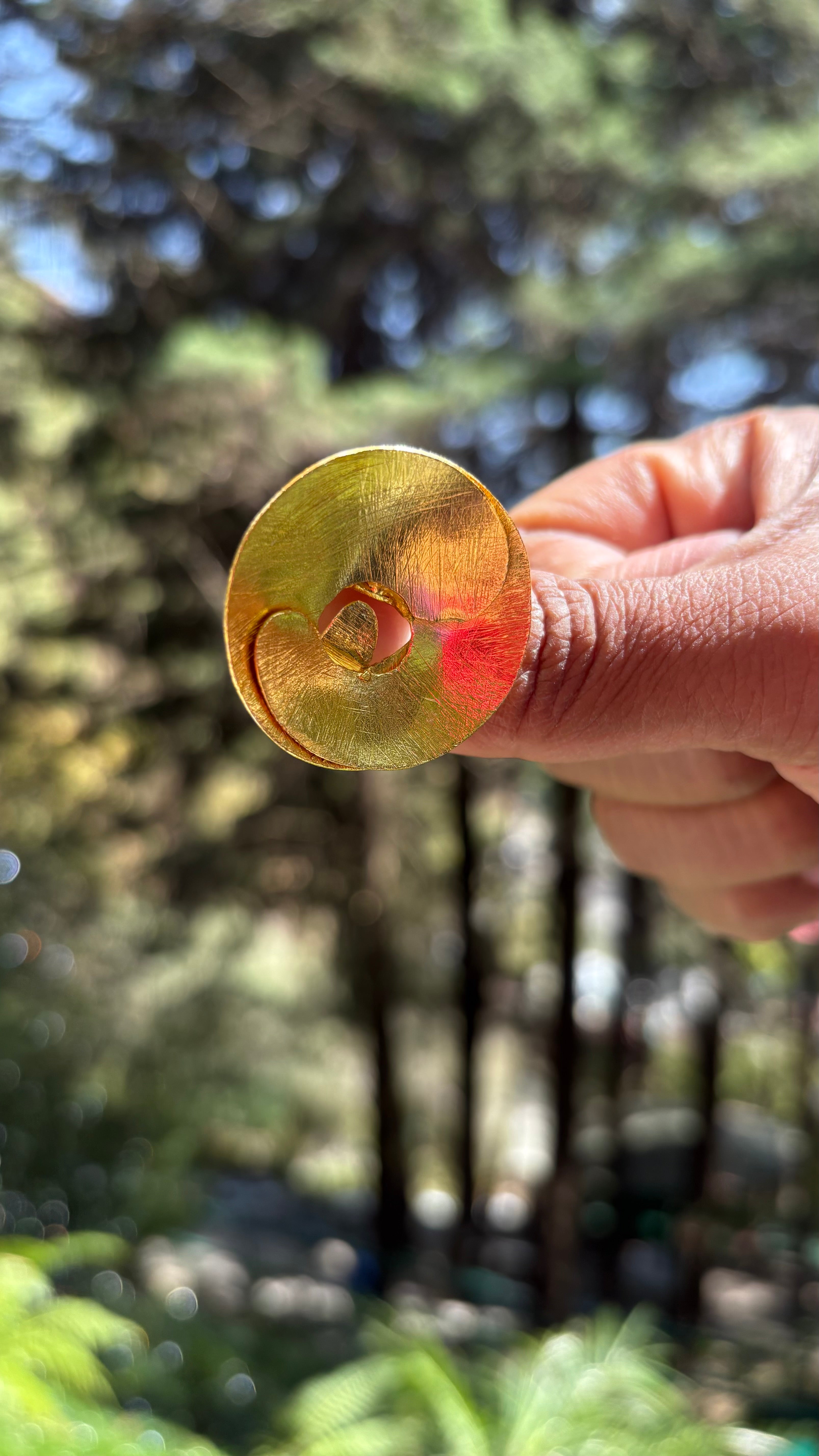 Oval curl ring ( size S min adjustable) Riverblend