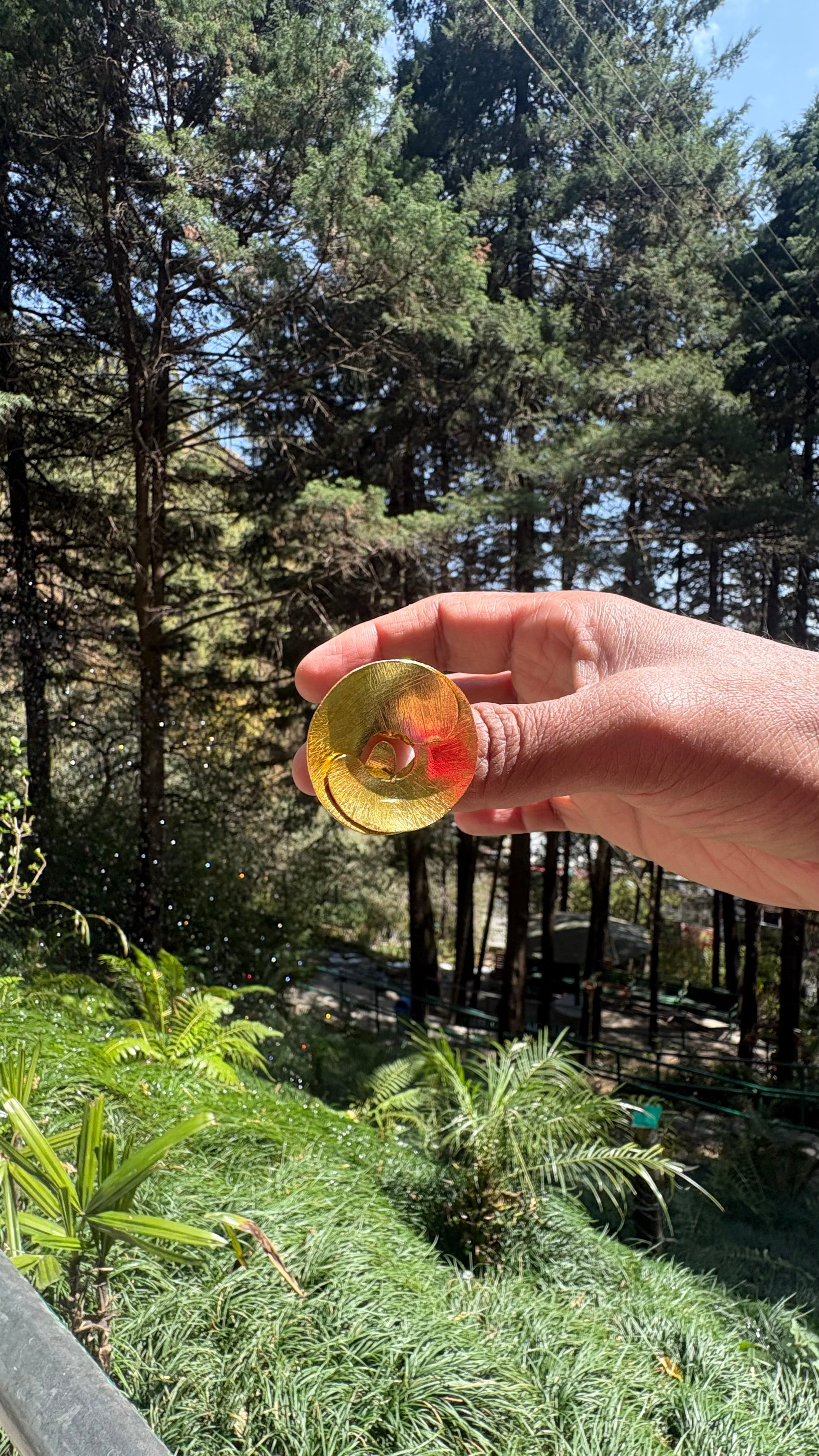 Oval curl ring ( size S min adjustable) Riverblend