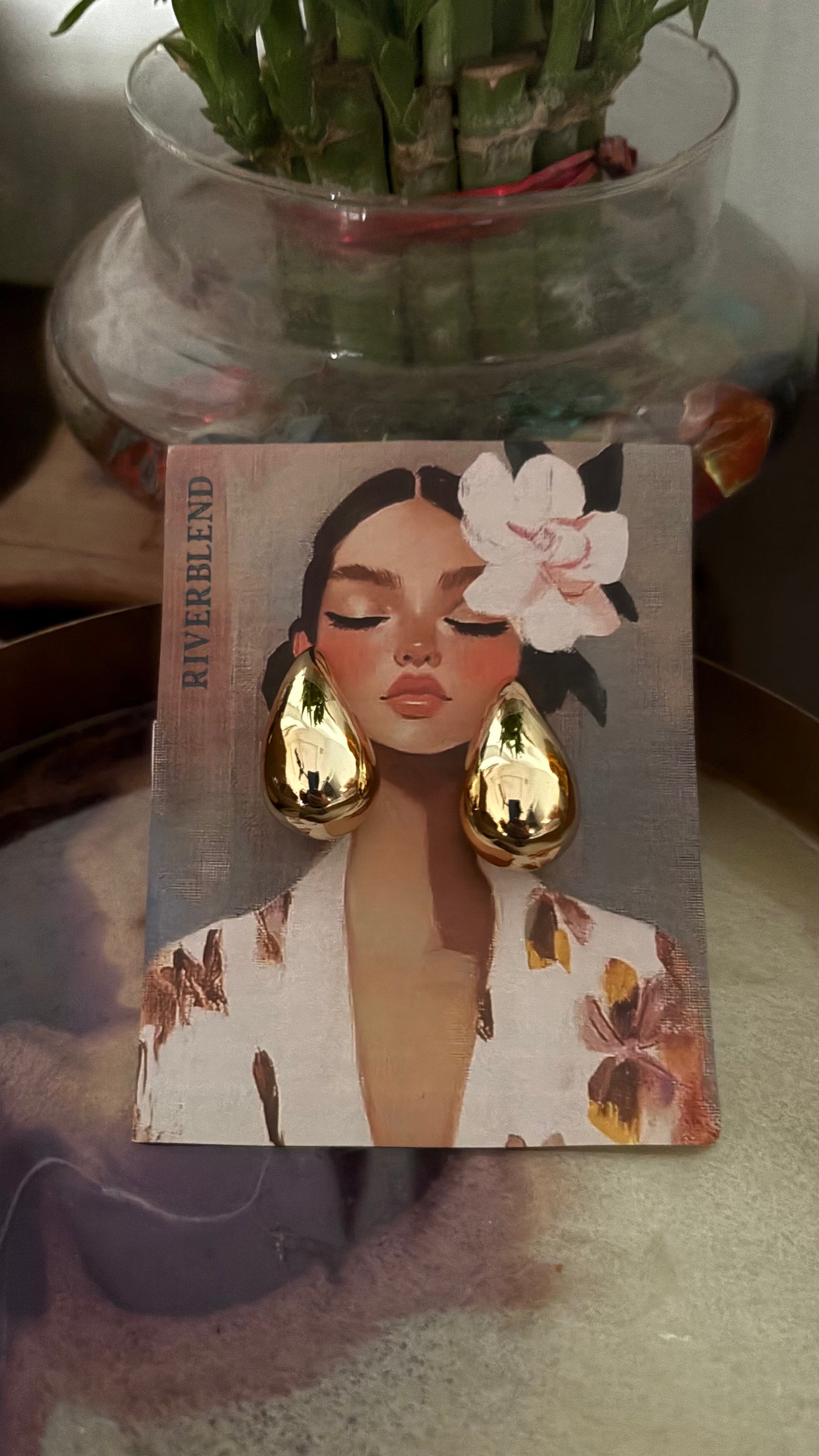 Tear drop gold earring