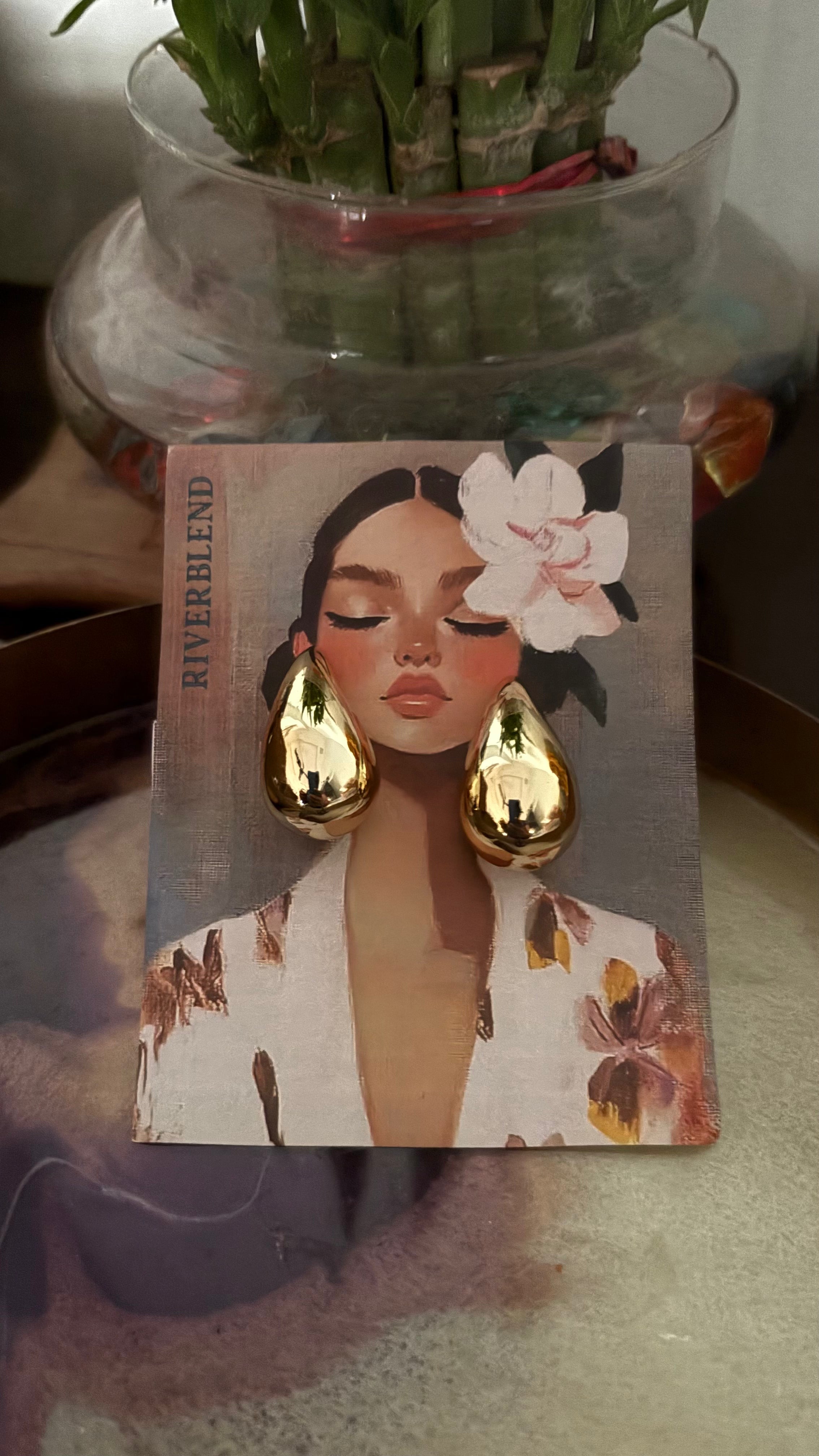 Tear drop gold earring