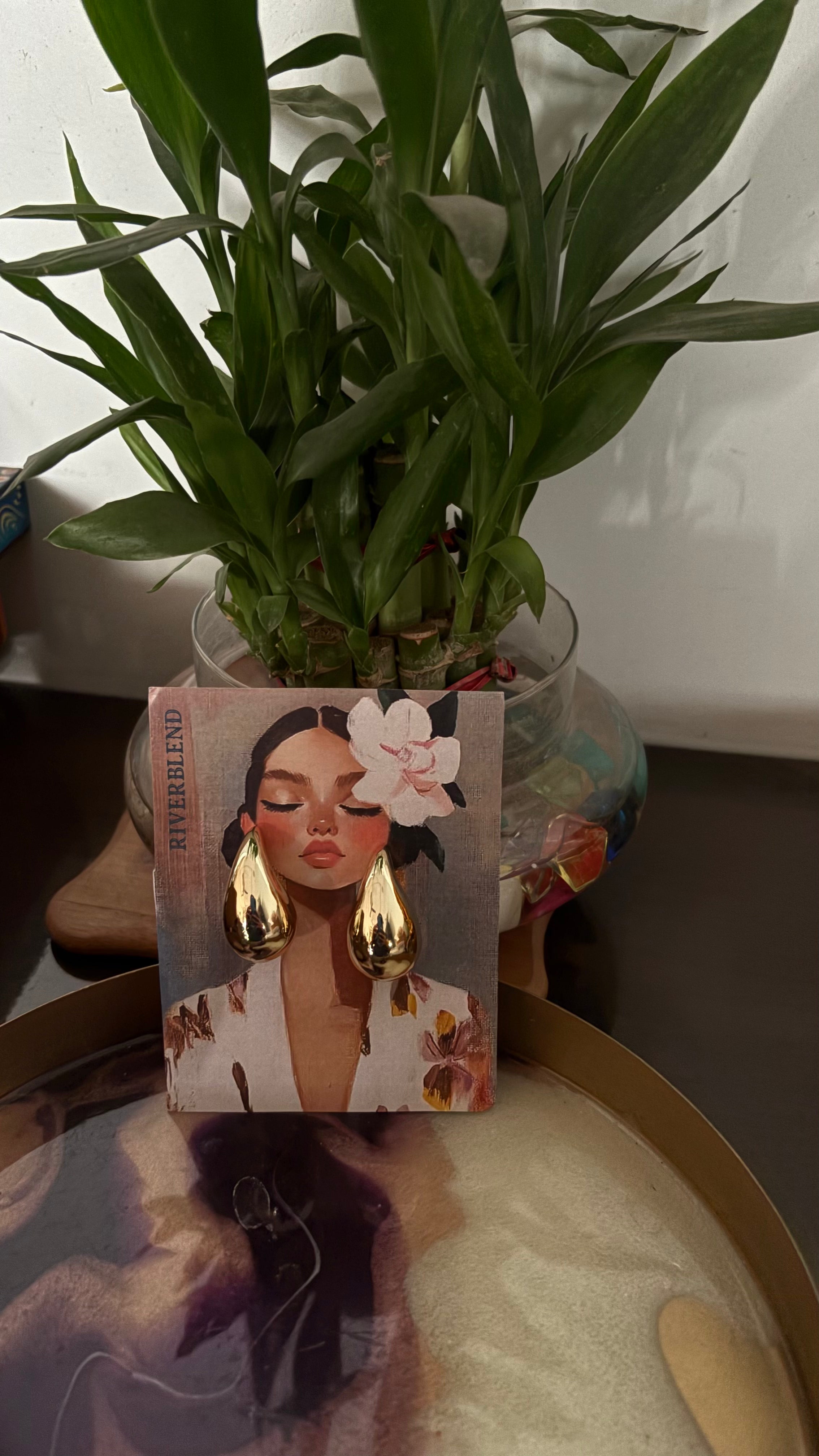 Tear drop gold earring