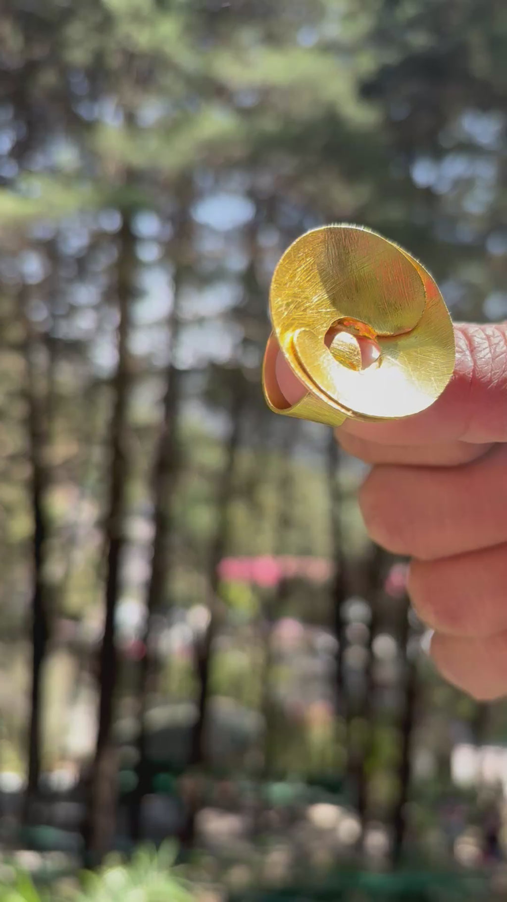 Oval curl ring ( size S min adjustable) Riverblend