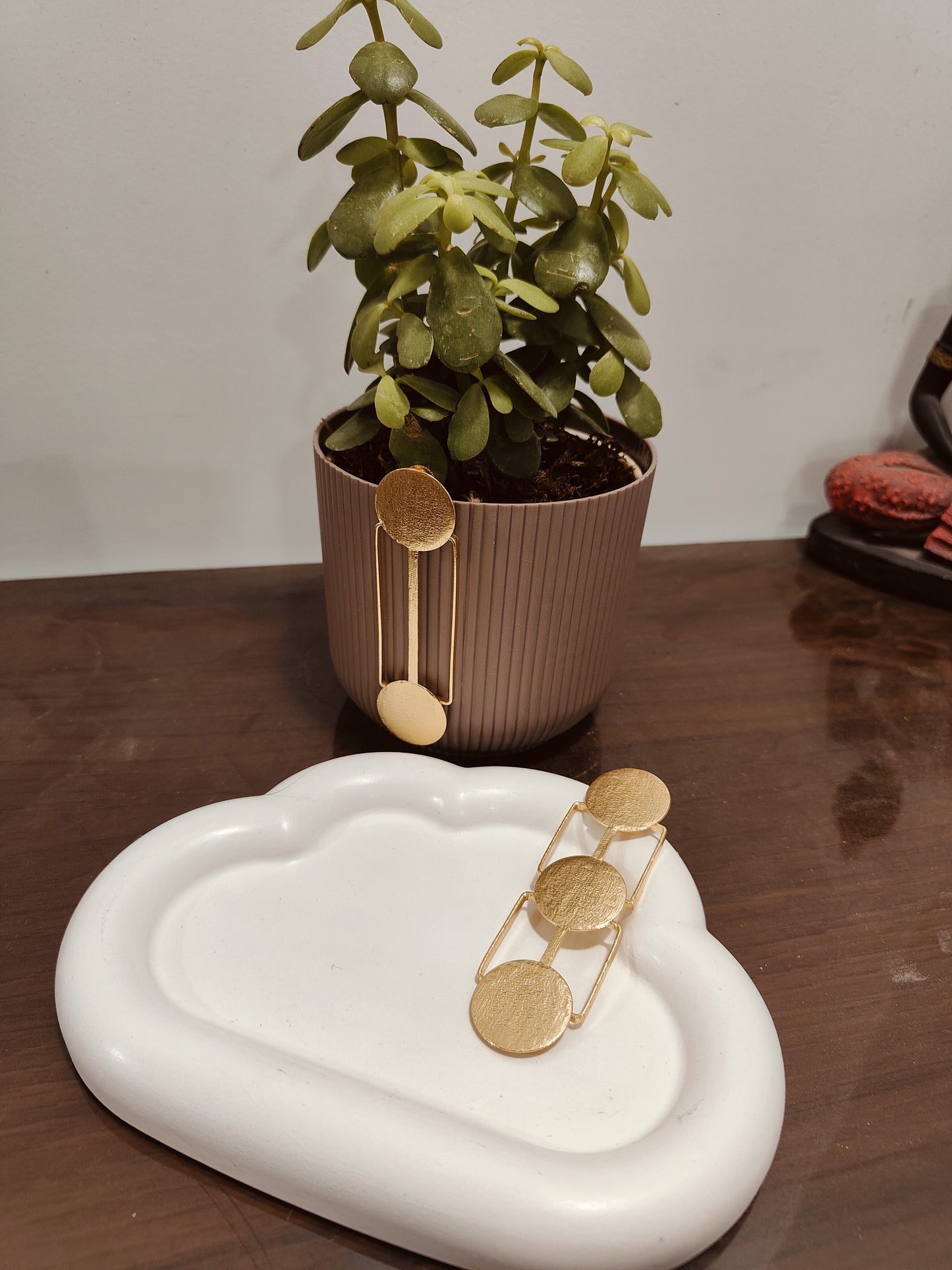 Mismatched brass earrings